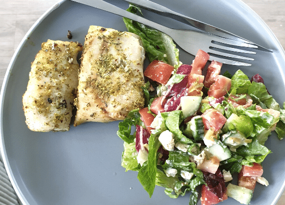 Lemon & herb hake with Greek Salad